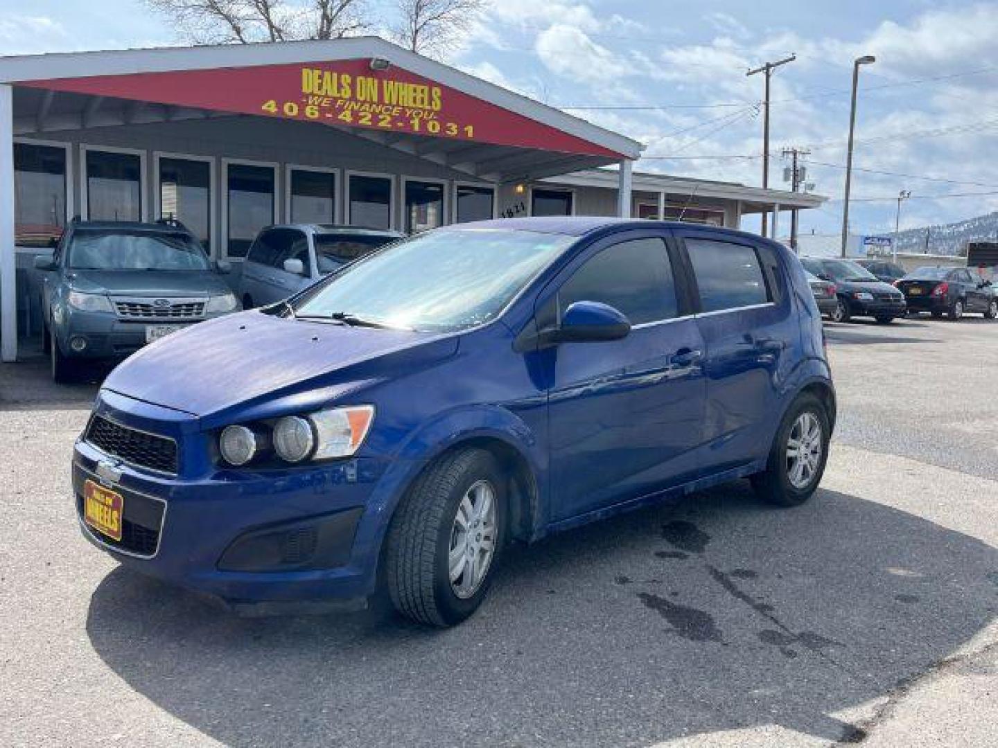 2014 Chevrolet Sonic LT Auto 5-Door (1G1JC6SG9E4) with an 1.8L L4 DOHC 24V engine, 6-Speed Automatic transmission, located at 1821 N Montana Ave., Helena, MT, 59601, (406) 422-1031, 0.000000, 0.000000 - Photo#0