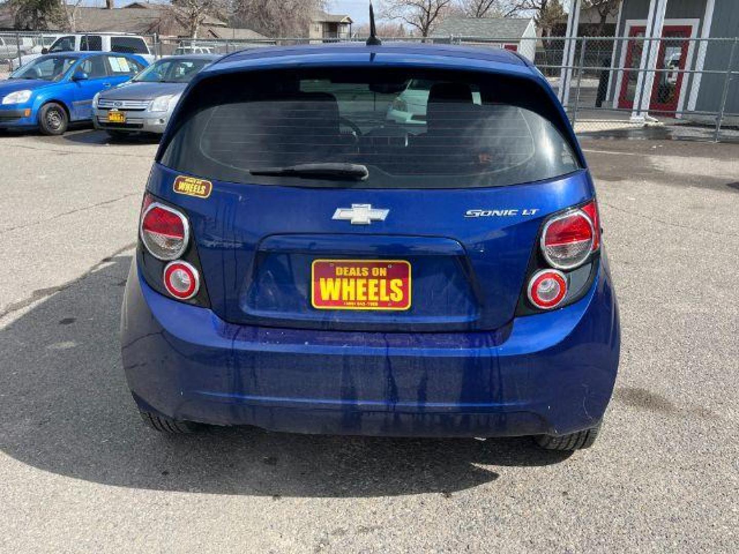 2014 Chevrolet Sonic LT Auto 5-Door (1G1JC6SG9E4) with an 1.8L L4 DOHC 24V engine, 6-Speed Automatic transmission, located at 1821 N Montana Ave., Helena, MT, 59601, (406) 422-1031, 0.000000, 0.000000 - Photo#4