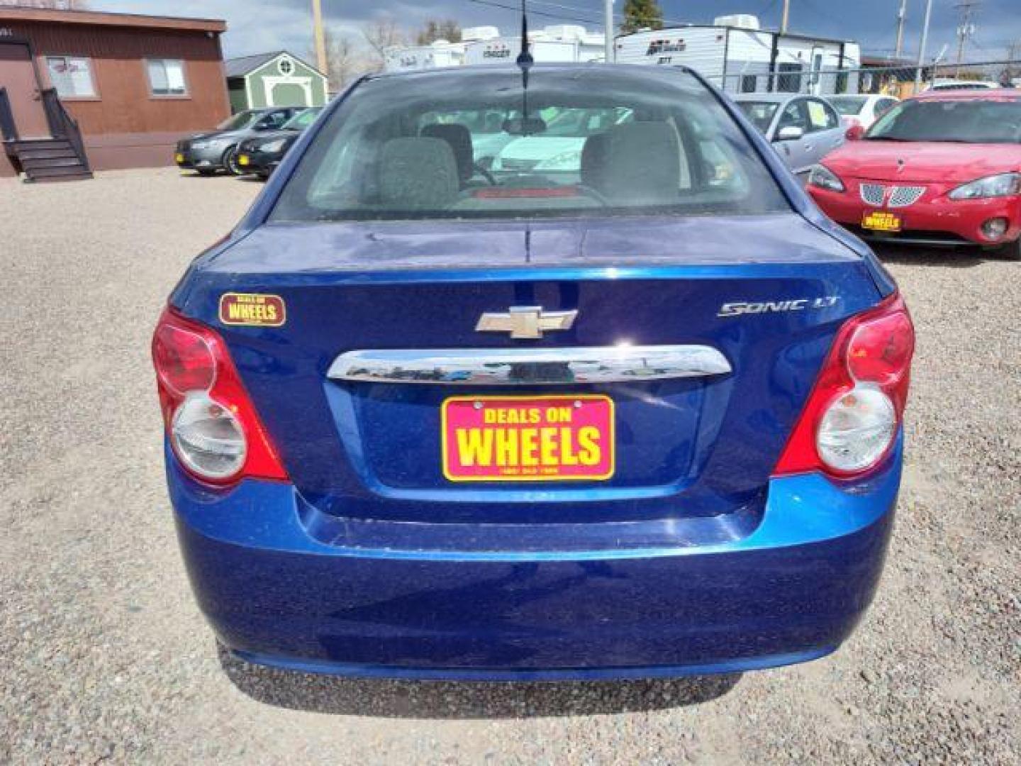 2014 Chevrolet Sonic LT Auto Sedan (1G1JC5SH6E4) with an 1.8L L4 DOHC 24V engine, 6-Speed Automatic transmission, located at 4801 10th Ave S,, Great Falls, MT, 59405, 0.000000, 0.000000 - Photo#3