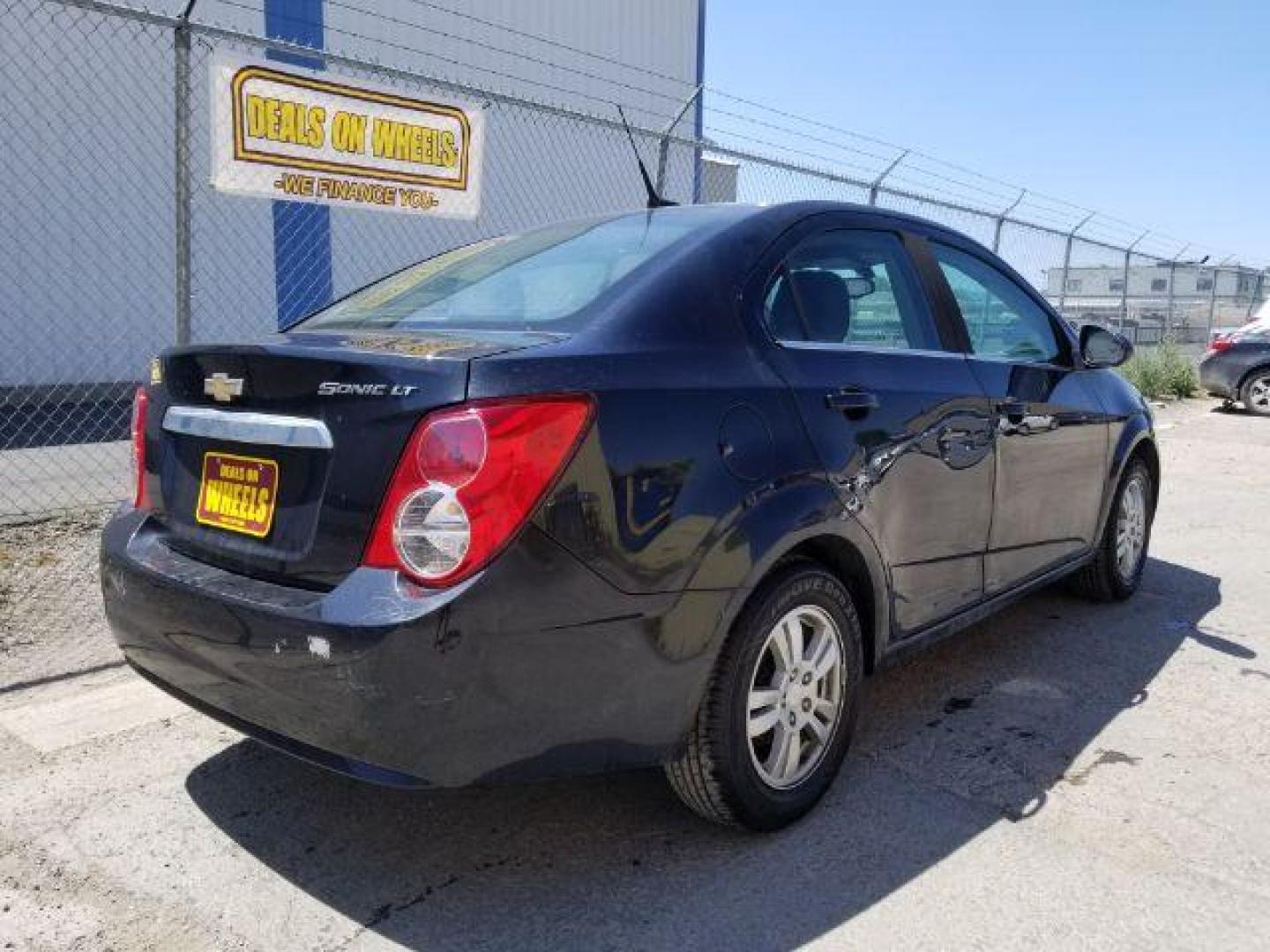 2014 Chevrolet Sonic LT Auto Sedan (1G1JC5SH7E4) with an 1.8L L4 DOHC 24V engine, 6-Speed Automatic transmission, located at 1821 N Montana Ave., Helena, MT, 59601, (406) 422-1031, 0.000000, 0.000000 - Photo#11