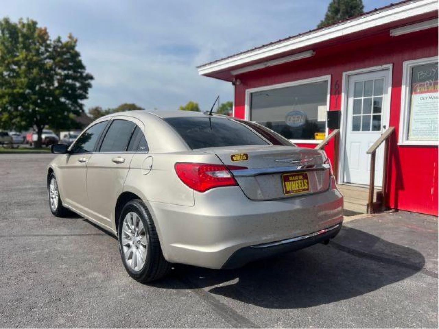 2014 Chrysler 200 LX (1C3CCBAB4EN) with an 2.4L L4 DOHC 16V engine, 6-Speed Automatic transmission, located at 601 E. Idaho St., Kalispell, MT, 59901, 0.000000, 0.000000 - Photo#2