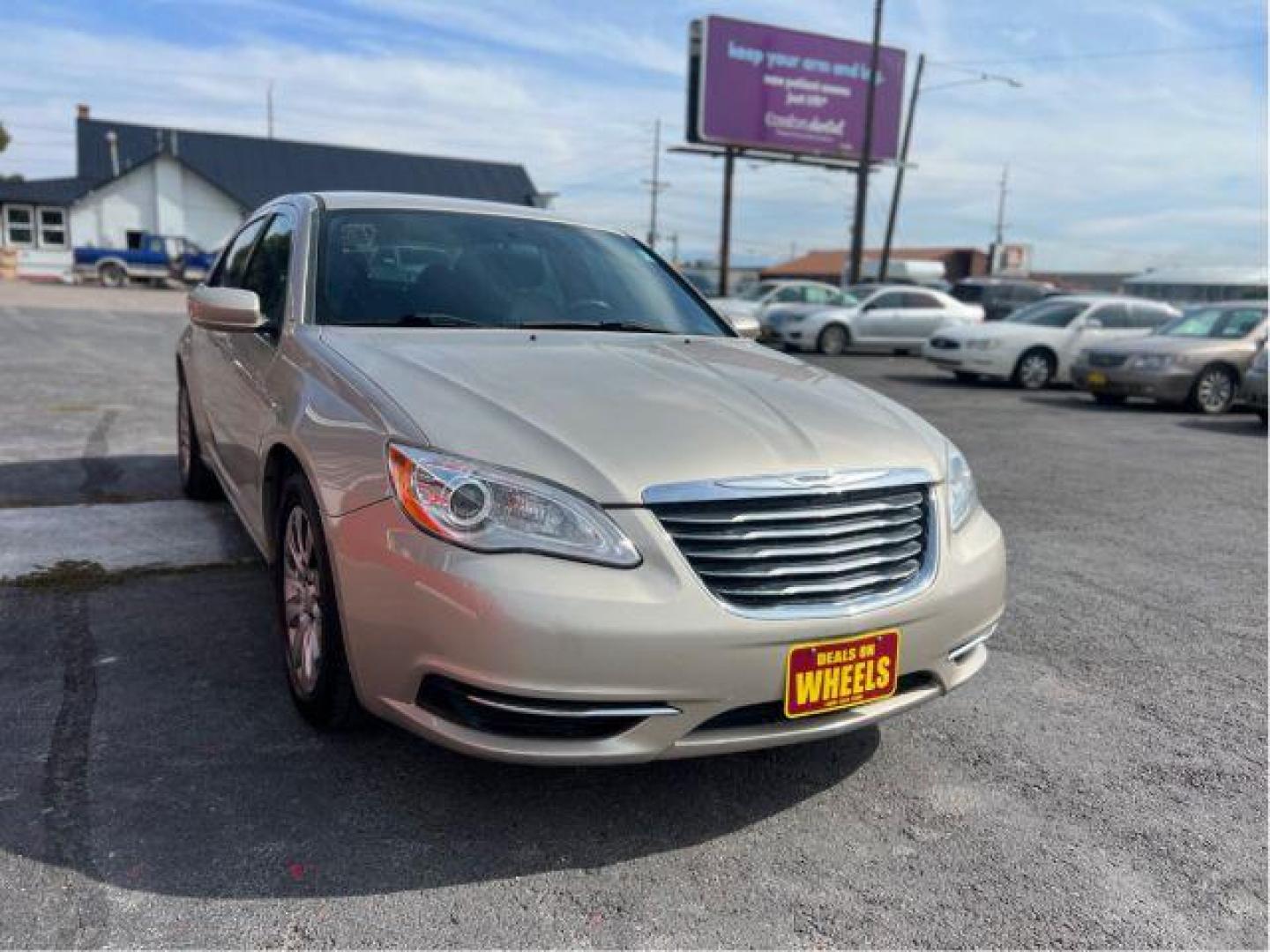 2014 Chrysler 200 LX (1C3CCBAB4EN) with an 2.4L L4 DOHC 16V engine, 6-Speed Automatic transmission, located at 601 E. Idaho St., Kalispell, MT, 59901, 0.000000, 0.000000 - Photo#6