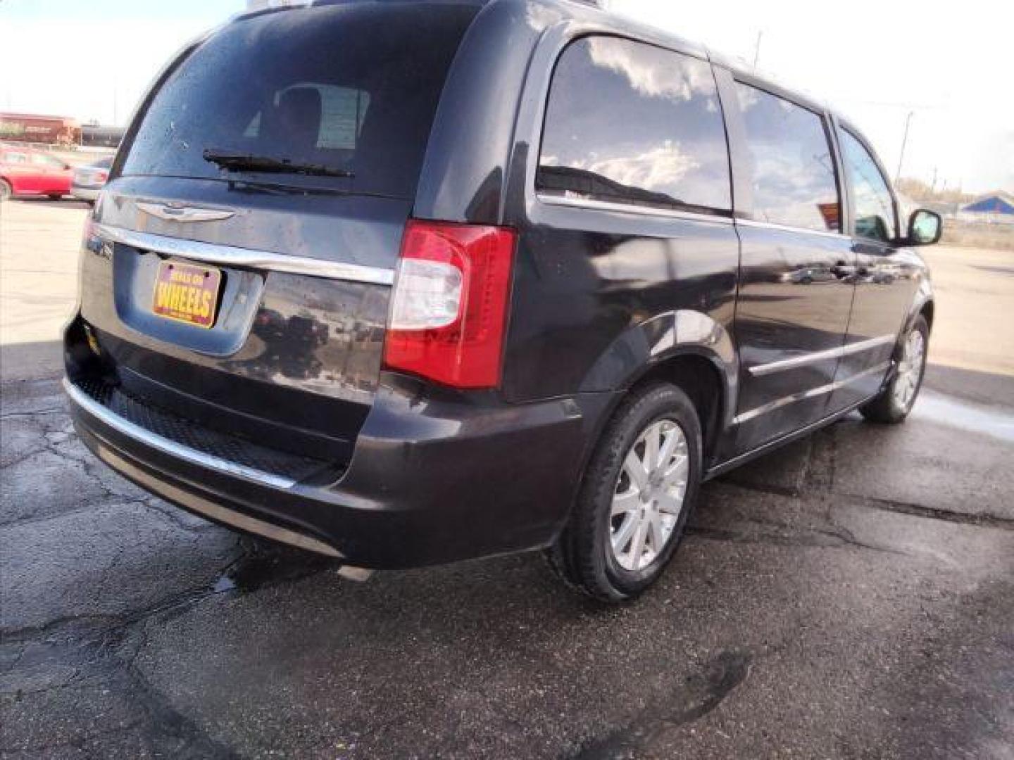 2014 Chrysler Town and Country Touring (2C4RC1BG1ER) with an 3.6L V6 DOHC 24V engine, 6-Speed Automatic transmission, located at 4047 Montana Ave., Billings, MT, 59101, 45.770847, -108.529800 - Photo#4