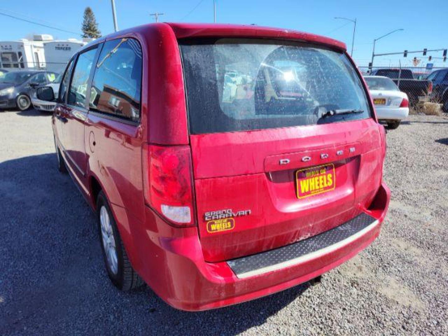 2014 Dodge Grand Caravan SE (2C4RDGBG2ER) with an 3.6L V6 DOHC 24V engine, 6-Speed Automatic transmission, located at 4801 10th Ave S,, Great Falls, MT, 59405, 0.000000, 0.000000 - Photo#2