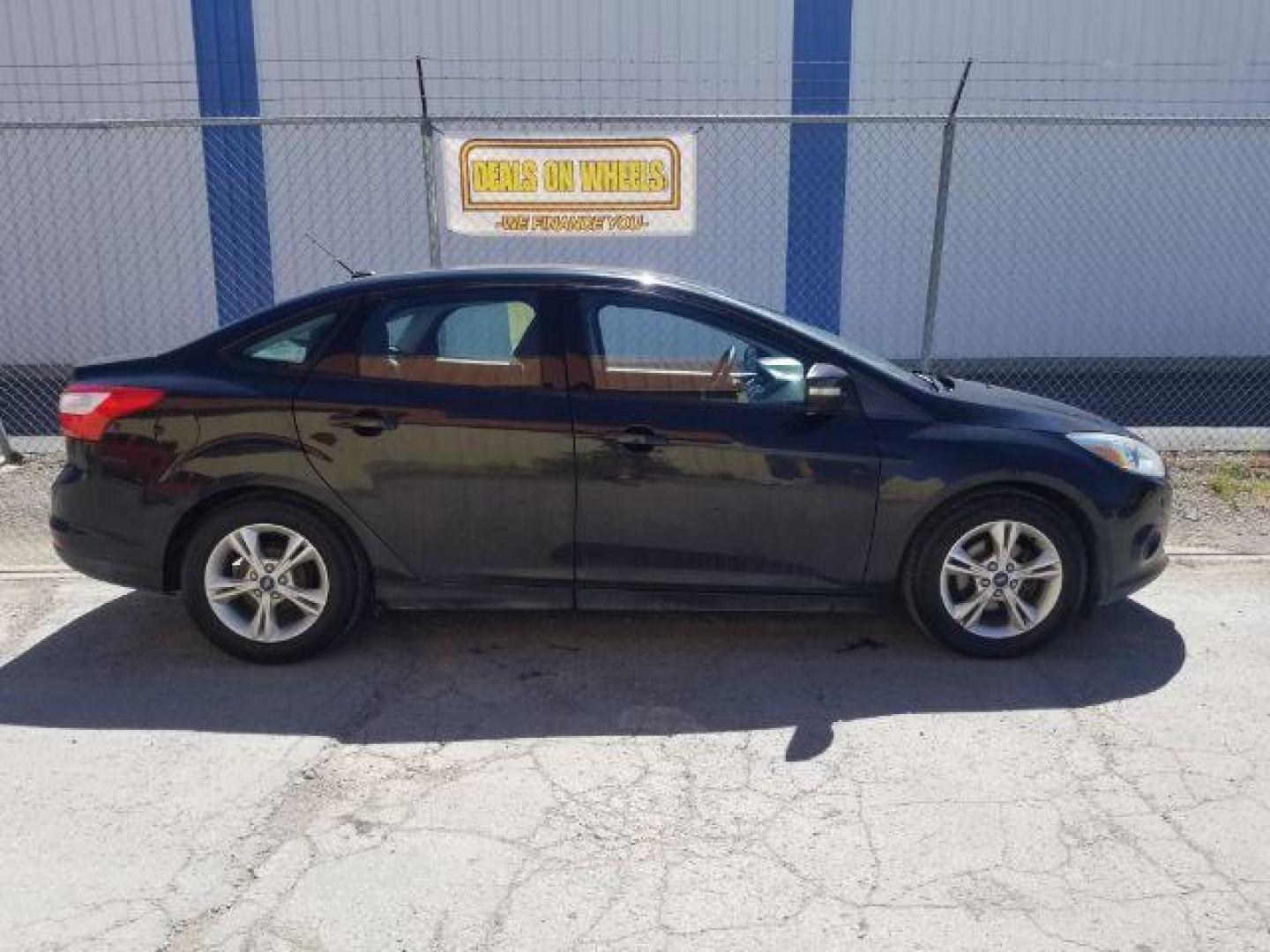 2014 Ford Focus SE Sedan (1FADP3F20EL) with an 2.0L L4 DOHC 16V engine, located at 4801 10th Ave S,, Great Falls, MT, 59405, 0.000000, 0.000000 - Photo#9