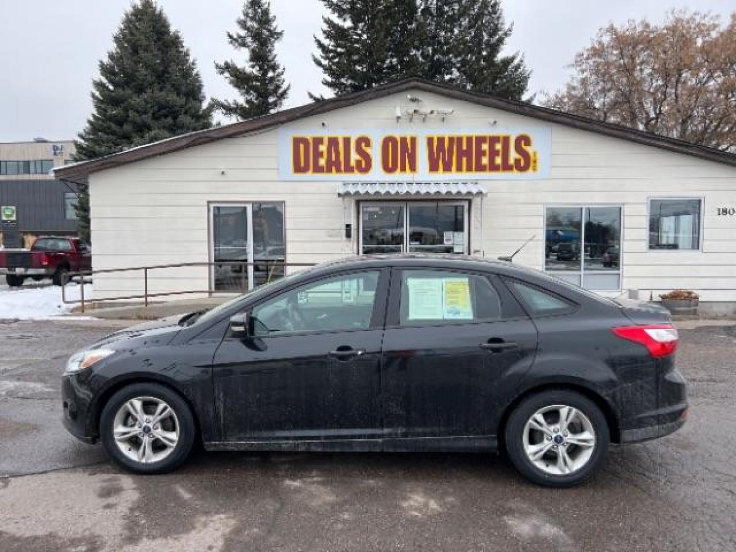 2014 Tuxedo Black Metalli Ford Focus SE Sedan (1FADP3F20EL) with an 2.0L L4 DOHC 16V engine, located at 1800 West Broadway, Missoula, 59808, (406) 543-1986, 46.881348, -114.023628 - Photo#5