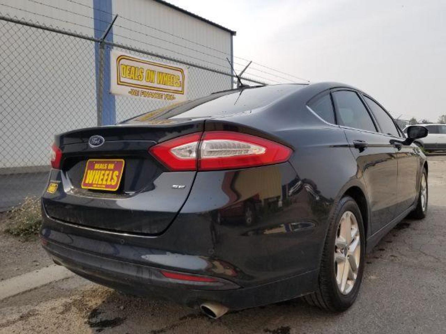 2014 Ford Fusion SE (3FA6P0H70ER) with an 2.5L L4 DOHC 16V engine, located at 4801 10th Ave S,, Great Falls, MT, 59405, 0.000000, 0.000000 - Photo#4