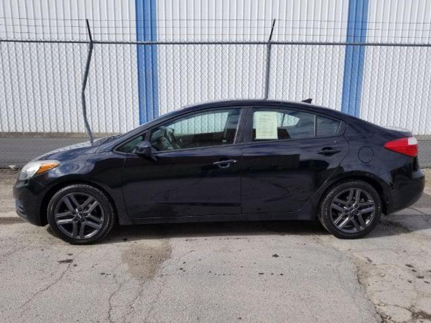 2014 Kia Forte LX M6 (KNAFK4A67E5) with an 1.8L L4 DOHC 16V engine, 6-Speed Manual transmission, located at 4047 Montana Ave., Billings, MT, 59101, 45.770847, -108.529800 - Photo#3