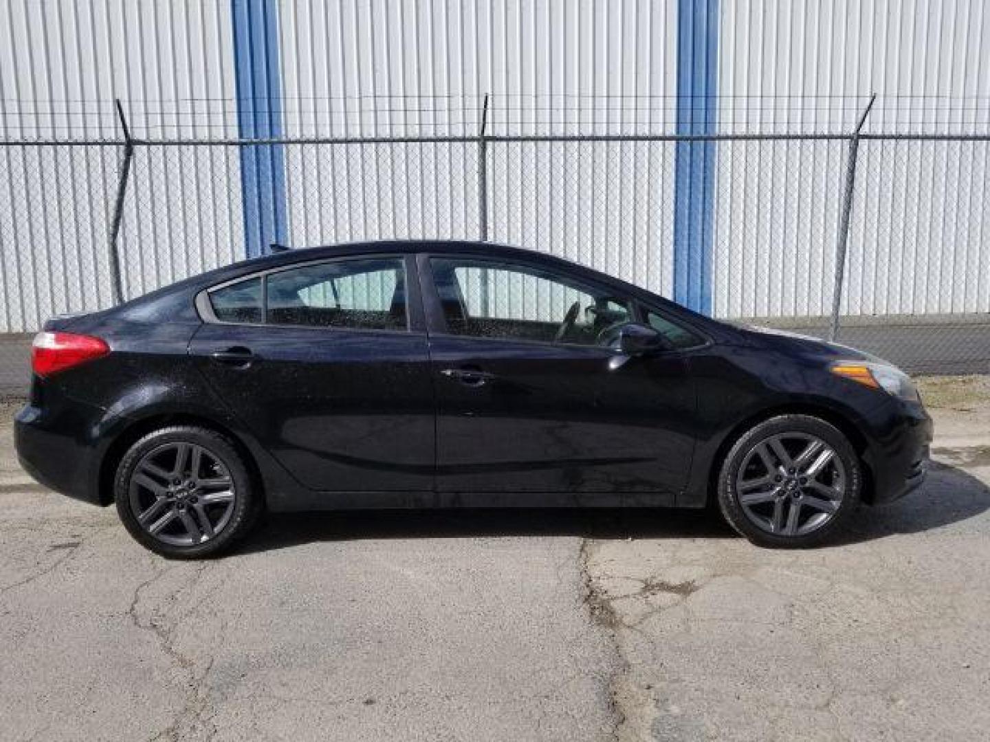 2014 Kia Forte LX M6 (KNAFK4A67E5) with an 1.8L L4 DOHC 16V engine, 6-Speed Manual transmission, located at 4047 Montana Ave., Billings, MT, 59101, 45.770847, -108.529800 - Photo#6