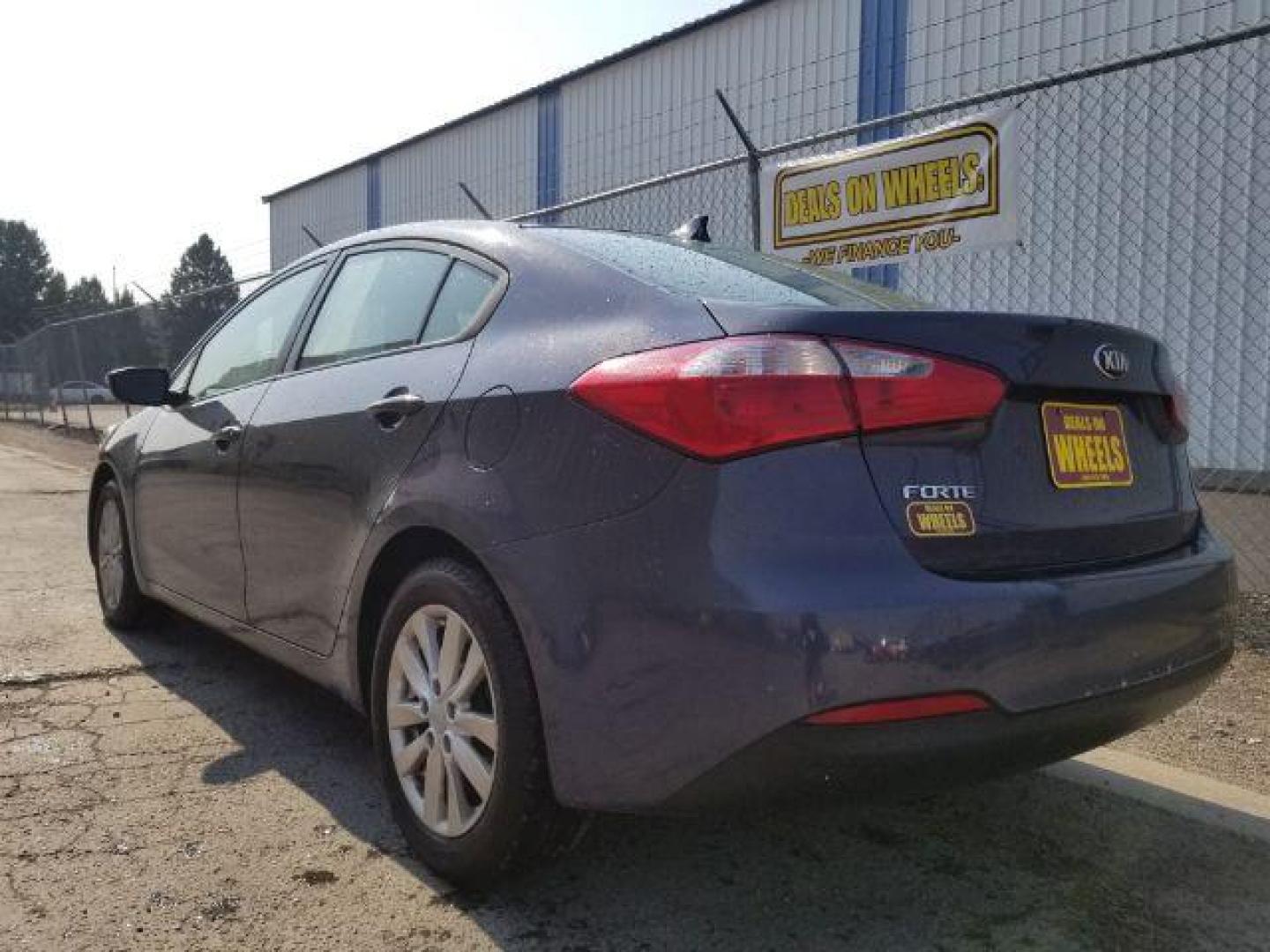 2014 Kia Forte EX (KNAFX4A66E5) with an 1.8L L4 DOHC 16V engine, 6-Speed Automatic transmission, located at 4047 Montana Ave., Billings, MT, 59101, 45.770847, -108.529800 - Photo#3