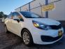 2014 Kia Rio LX (KNADM4A37E6) with an 1.6L L4 DOHC 16V engine, located at 1800 West Broadway, Missoula, 59808, (406) 543-1986, 46.881348, -114.023628 - Photo#2