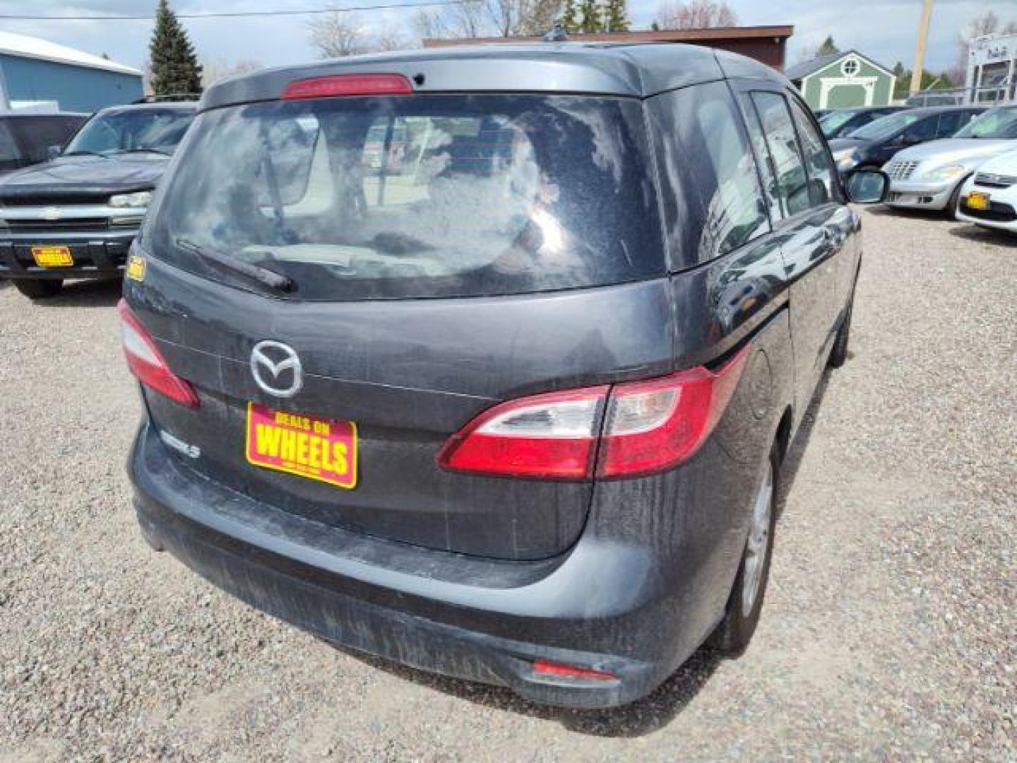 2014 Mazda MAZDA5 Sport AT (JM1CW2BL5E0) with an 2.5L L4 DOHC 16V engine, 5-Speed Automatic transmission, located at 4801 10th Ave S,, Great Falls, MT, 59405, 0.000000, 0.000000 - Photo#4