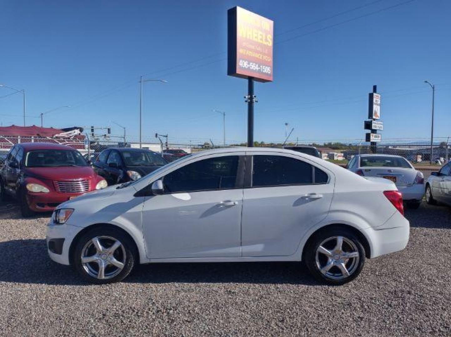 2015 Chevrolet Sonic LS Auto Sedan (1G1JA5SG2F4) with an 1.8L L4 DOHC 24V engine, 6-Speed Automatic transmission, located at 4801 10th Ave S,, Great Falls, MT, 59405, 0.000000, 0.000000 - Photo#1