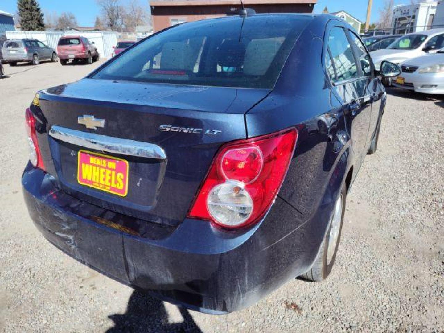 2015 Chevrolet Sonic LT Auto Sedan (1G1JC5SHXF4) with an 1.8L L4 DOHC 24V engine, 6-Speed Automatic transmission, located at 4801 10th Ave S,, Great Falls, MT, 59405, 0.000000, 0.000000 - Photo#4