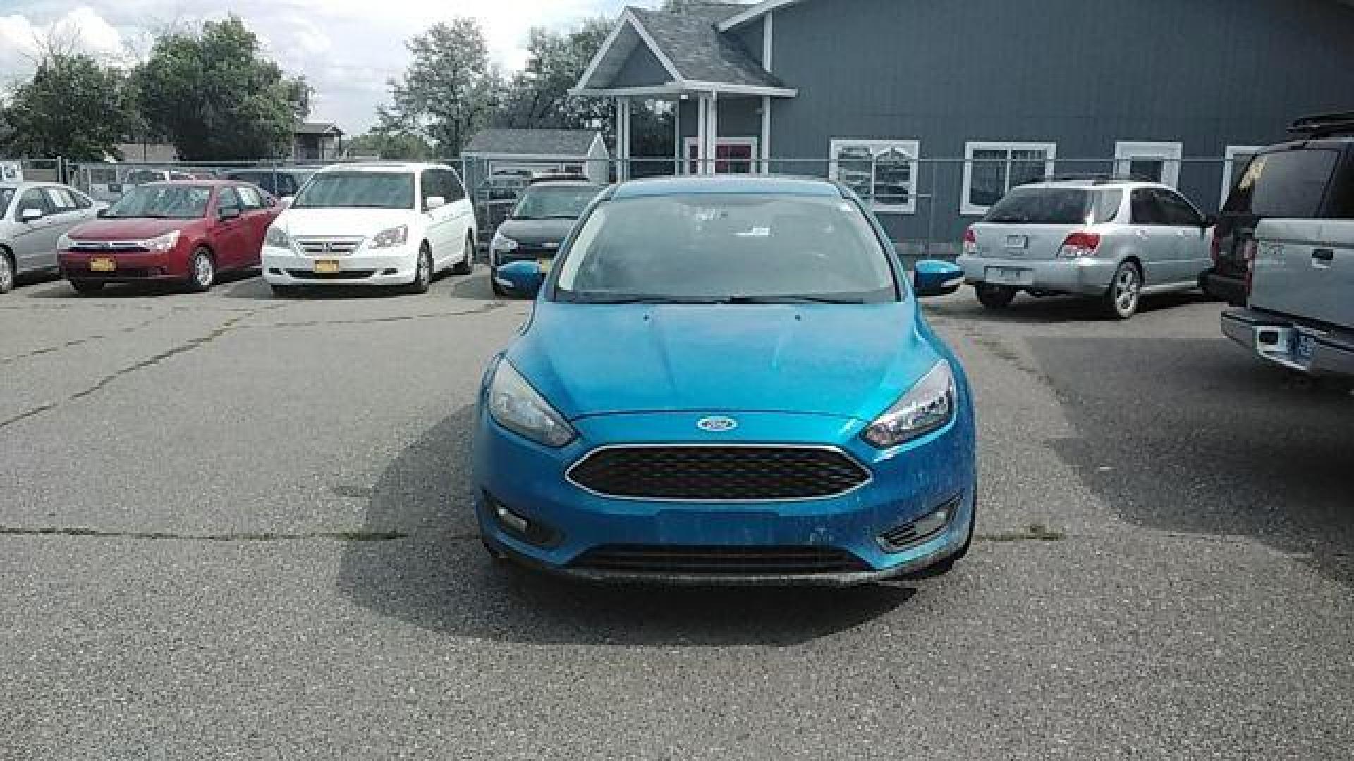 2015 Ford Focus SE Hatch (1FADP3K29FL) with an 2.0L L4 DOHC 16V engine, 5-Speed Manual transmission, located at 1821 N Montana Ave., Helena, MT, 59601, (406) 422-1031, 0.000000, 0.000000 - Photo#1