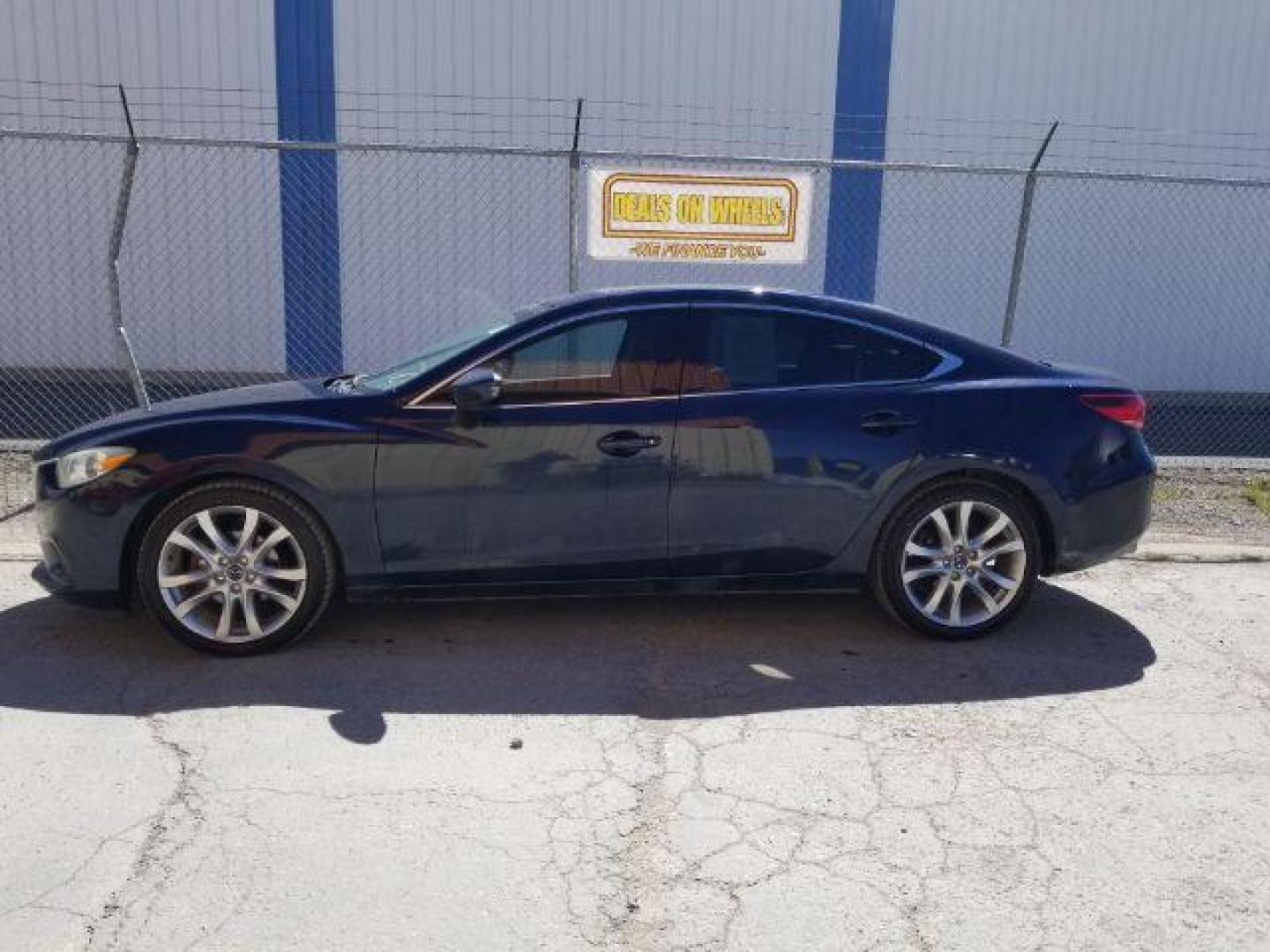 2015 Deep Crystal Blue Mazda Mazda6 i Touring (JM1GJ1V56F1) with an 2.5L L4 DOHC 16V engine, 6-Speed Automatic transmission, located at 4047 Montana Ave., Billings, MT, 59101, 45.770847, -108.529800 - Photo#2