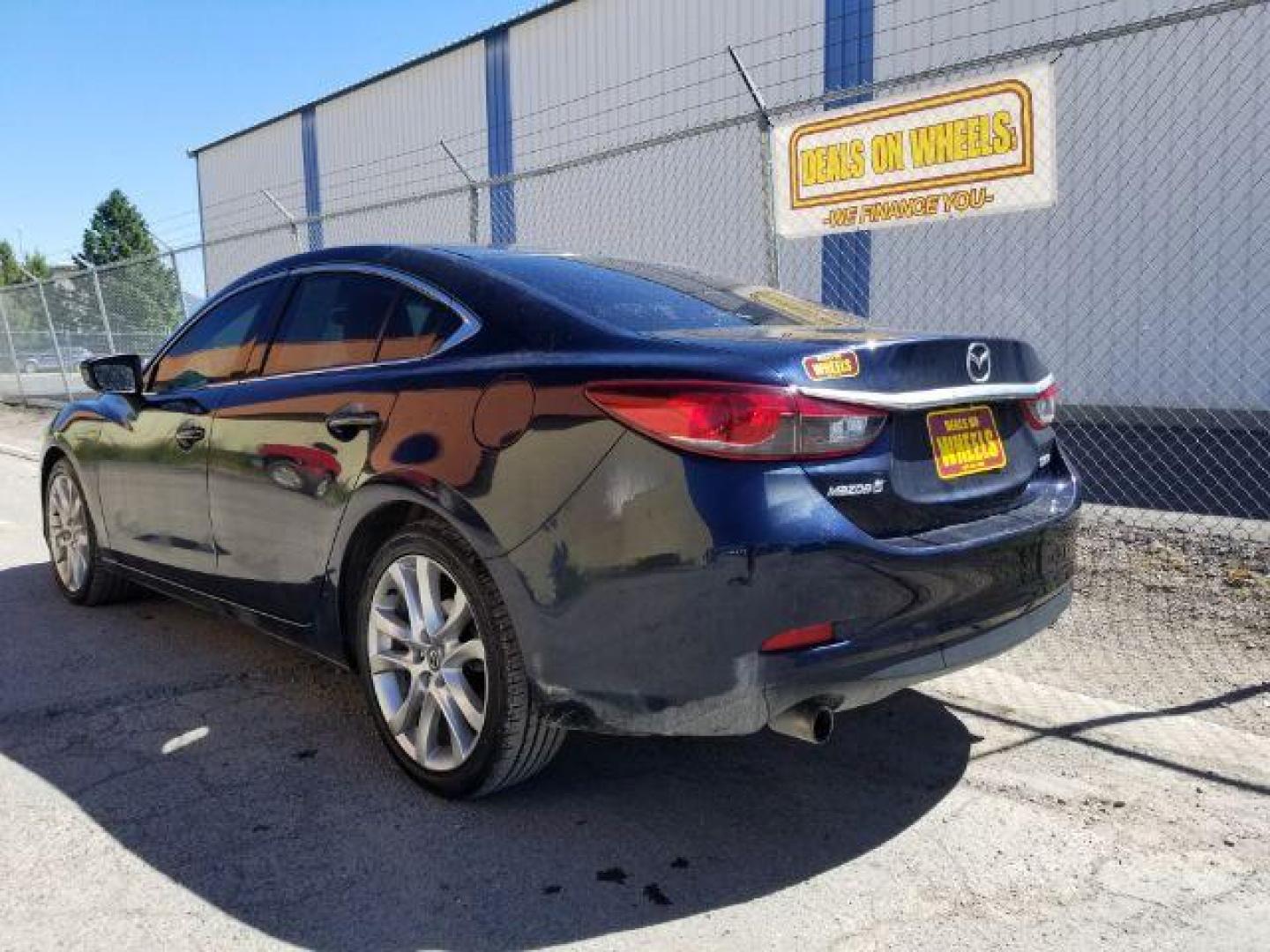 2015 Deep Crystal Blue Mazda Mazda6 i Touring (JM1GJ1V56F1) with an 2.5L L4 DOHC 16V engine, 6-Speed Automatic transmission, located at 4047 Montana Ave., Billings, MT, 59101, 45.770847, -108.529800 - Photo#3