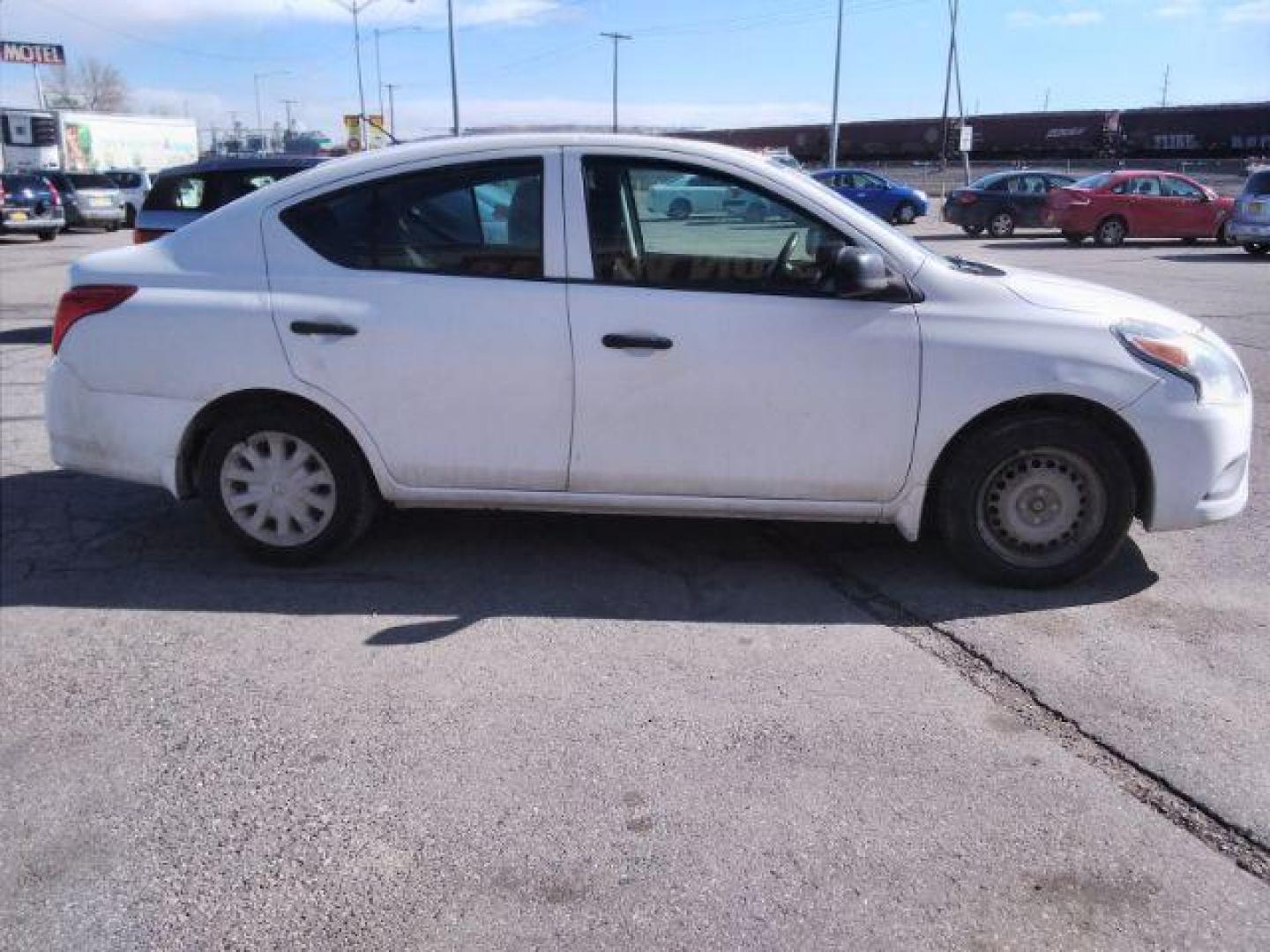 2015 Nissan Versa 1.6 S 5M (3N1CN7AP6FL) with an 1.6L L4 DOHC 16V engine, 5-Speed Manual transmission, located at 4047 Montana Ave., Billings, MT, 59101, 45.770847, -108.529800 - Photo#4