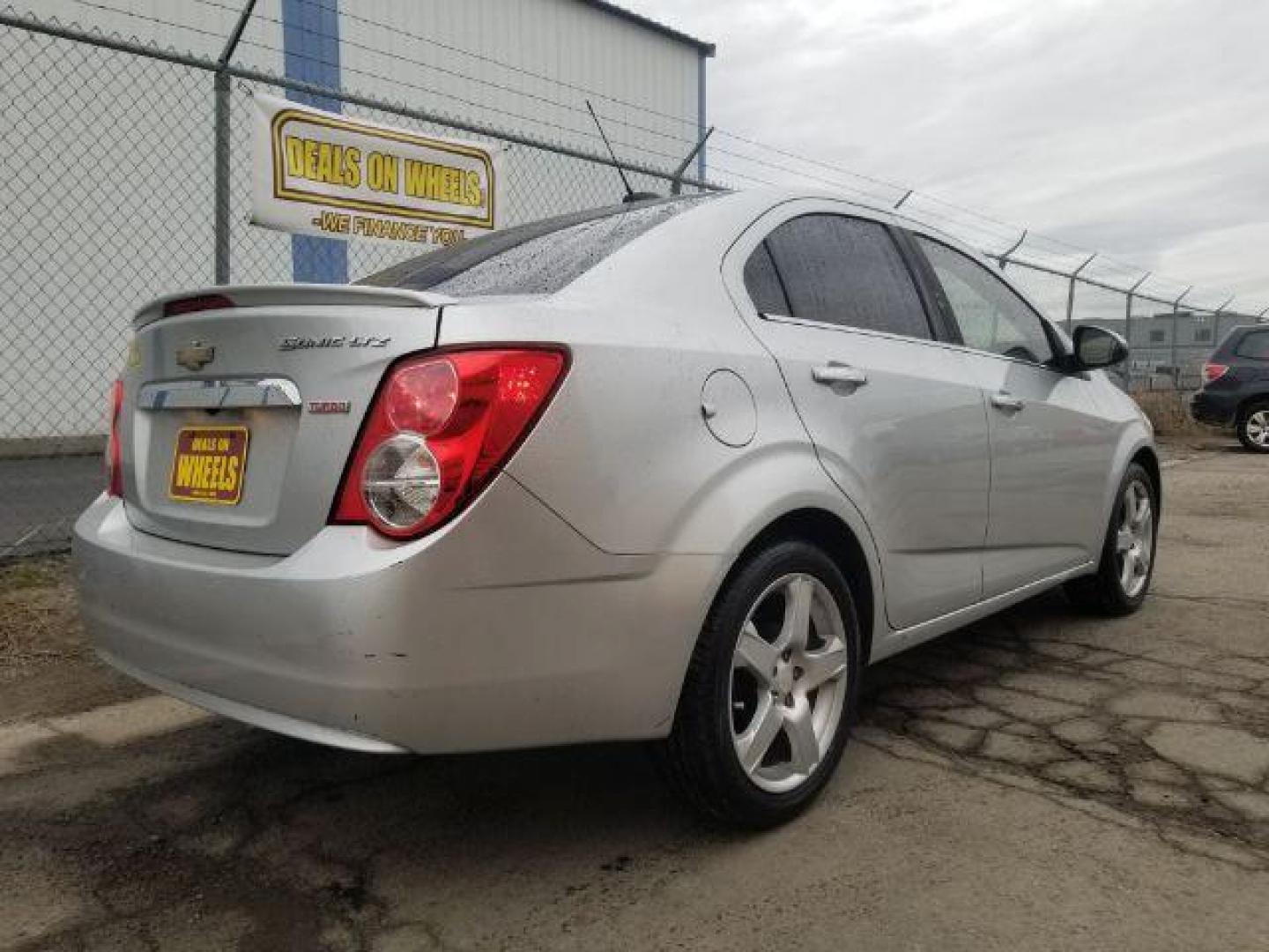 2016 Chevrolet Sonic LTZ Auto Sedan (1G1JE5SB6G4) with an 1.4L L4 DOHC 24V TURBO engine, 6-Speed Automatic transmission, located at 4047 Montana Ave., Billings, MT, 59101, 45.770847, -108.529800 - Photo#4