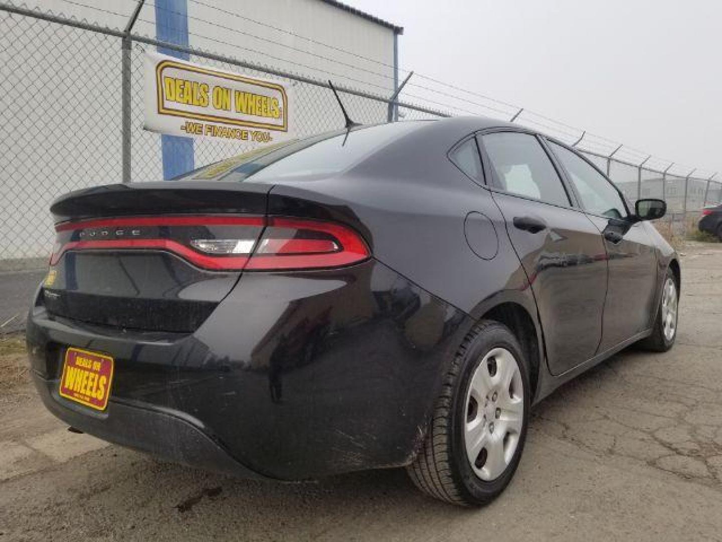 2016 Black Dodge Dart SE (1C3CDFAA7GD) with an 2.0L L4 DOHC 16V TUR engine, located at 601 E. Idaho St., Kalispell, MT, 59901, 0.000000, 0.000000 - Photo#4