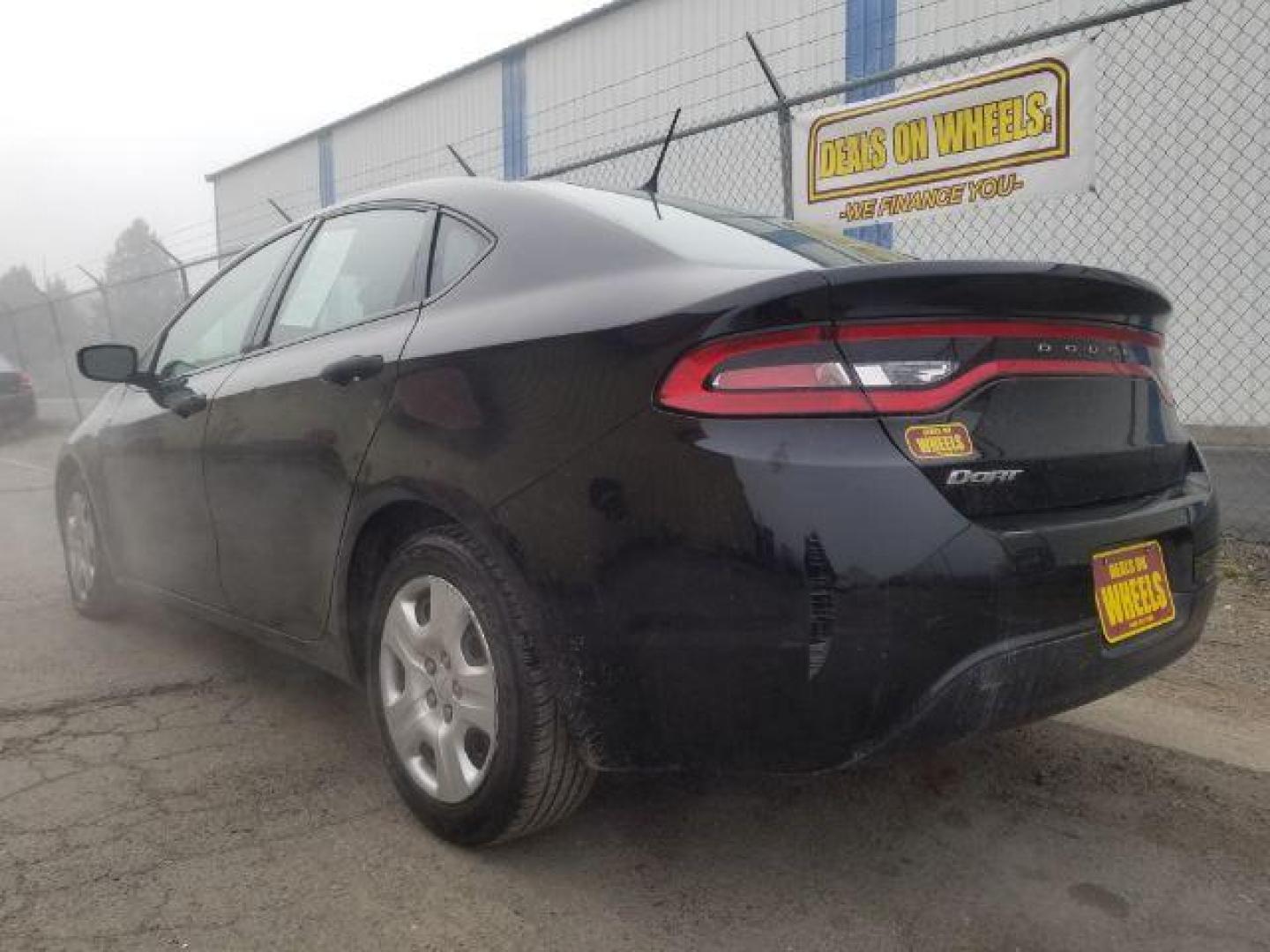 2016 Black Dodge Dart SE (1C3CDFAA7GD) with an 2.0L L4 DOHC 16V TUR engine, located at 601 E. Idaho St., Kalispell, MT, 59901, 0.000000, 0.000000 - Photo#5