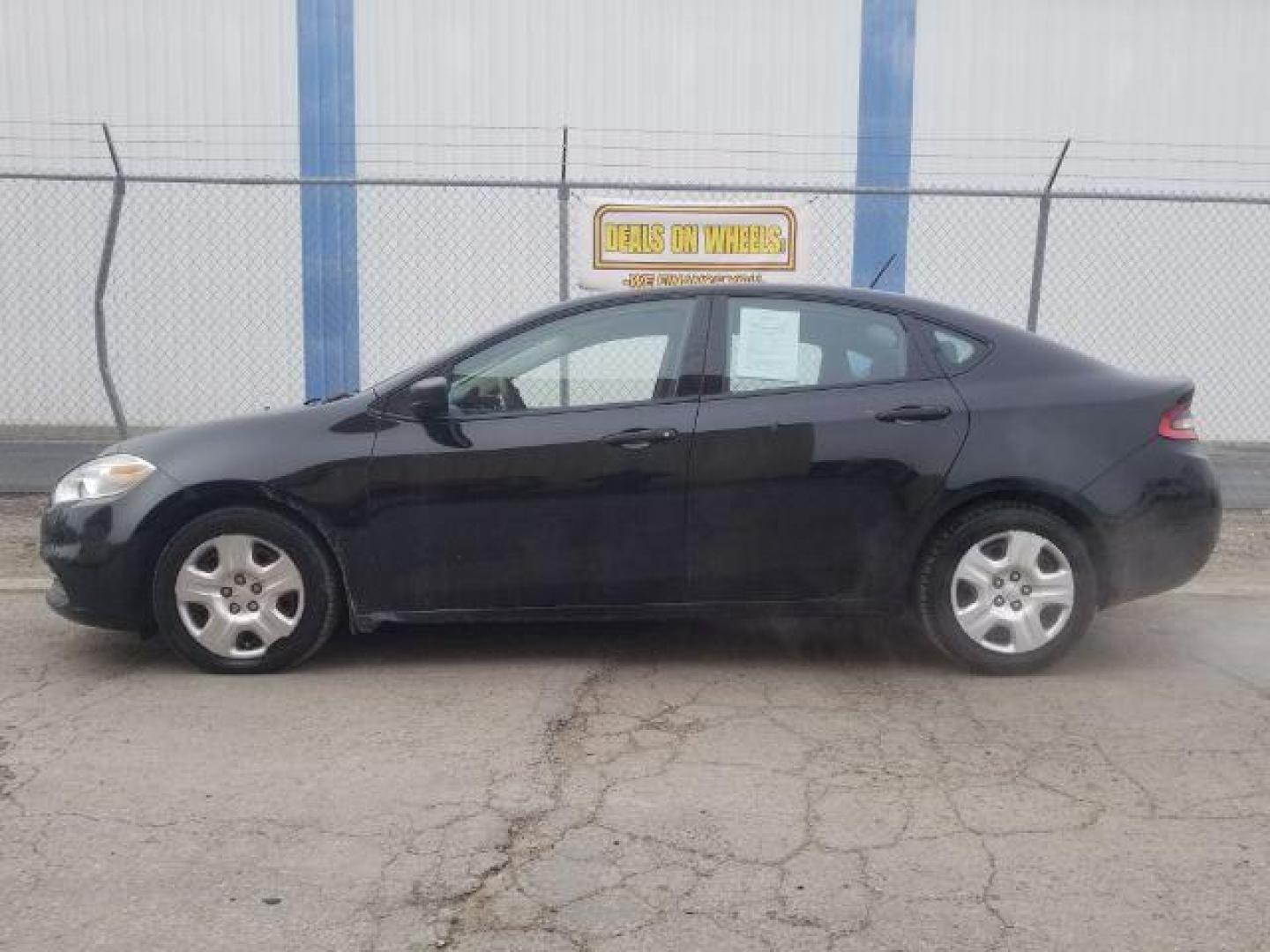 2016 Black Dodge Dart SE (1C3CDFAA7GD) with an 2.0L L4 DOHC 16V TUR engine, located at 601 E. Idaho St., Kalispell, MT, 59901, 0.000000, 0.000000 - Photo#6